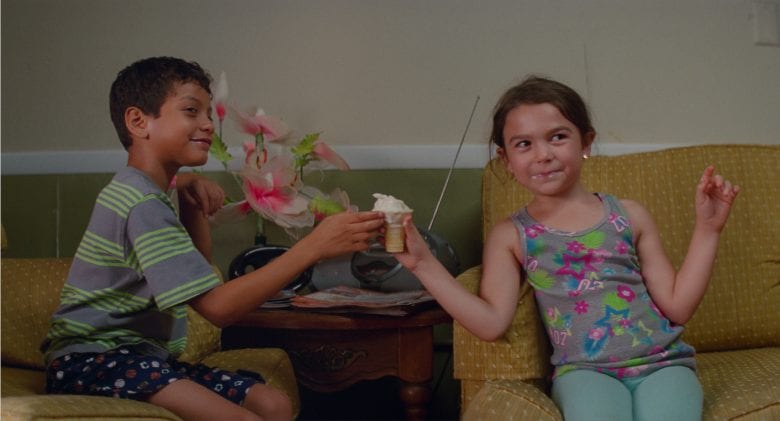 a young boy and girl share an ice cream in The Florida Project