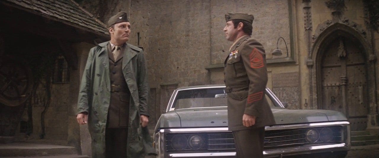 Psychiatrist Cl. Kane (Stacey Keach) arrives to treat his new patients in The Ninth Configuration. 