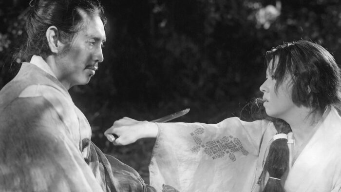 The Samurai and his Wife share a moment in Akira Kurosawa's Rashomon