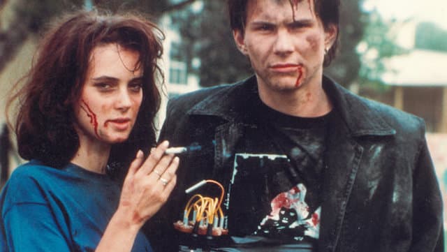 Winona Ryder (Veronica) and J.D. (Christian Slater) on the set of Heathers (1988).