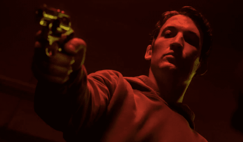 Martin Jones (Miles Teller) carries out one of his killings for ganglord Damian. 