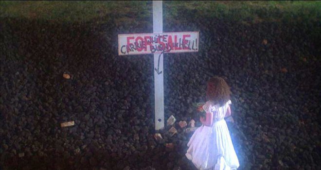 Sue Snell (Amy Irving) visits Carrie's grave in a dream sequence (and final jump scare) in Brian DePalma's Carrie (1976).