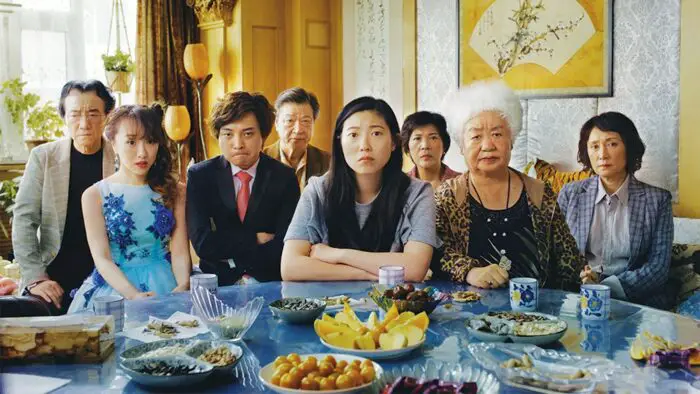 Left to Right: Jiang Yongbo, Aoi Mizuhara, Chen Han, Tzi Ma, Awkwafina, Li Xiang, Lu Hong, Diana Lin." Courtesy of Big Beach.