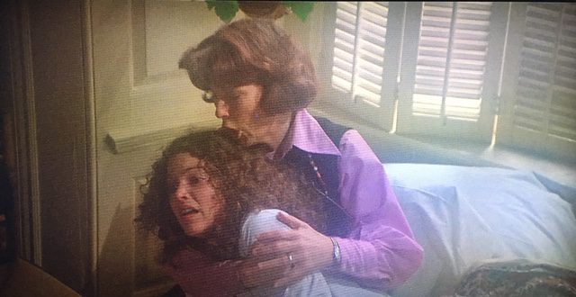 A terrified Sue Snell (Amy Irving) is comforted by her mother (Priscilla Pointer) after having a terrible nightmare in Carrie.
