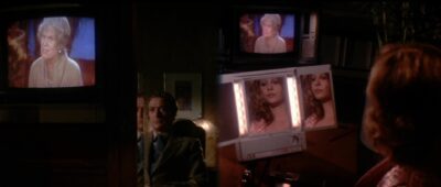 This classic scene from Dressed to Kill uses both split screen and diopter, plus images of screens and mirrors, to show an increasingly complex world of plot and perspective.