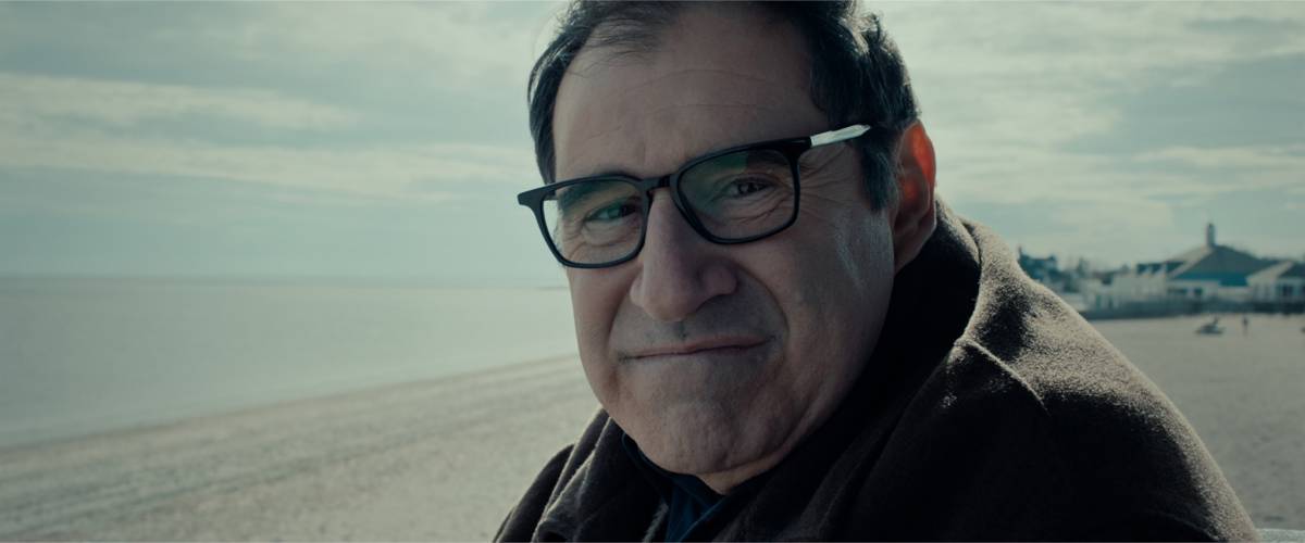 Felix (Richard Kind) gazes into the eyes of his imagined virtual assistant.