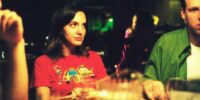 Young adult Marnie eats dinner at a restaurant with friends in Andrew Bujalski's film Funny Ha Ha.