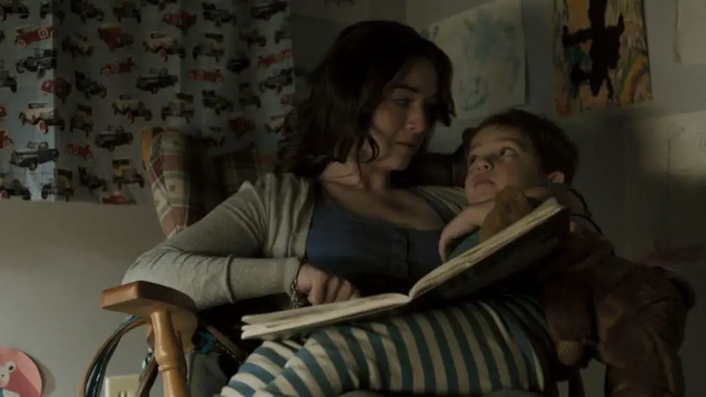 Sarah Bolger and Thomas Bair enjoy a bedtime story in Emilie (2015)