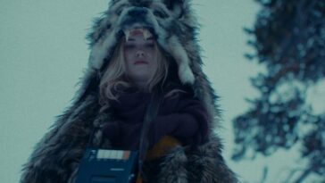 Aubrey (Virginia Gardner) dons protective warm weather gear and the mixtape that wards off evil.