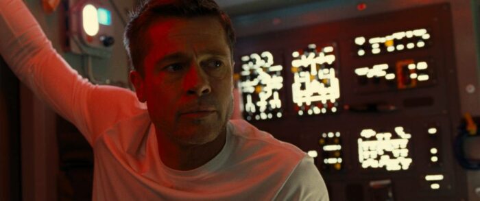 Roy McBride (Brad Pitt) listens intently for his latest orders aboard a rocket ship.
