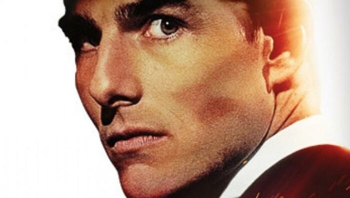 Tom Cruise as Hunt looking into lens