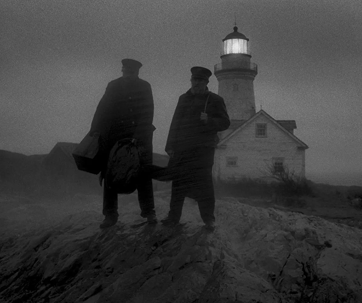 Ephram (left) and Thomas (right) watch their delivering ship depart as their arrive at their island lighthouse post.