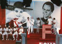 Farley Flavors take Janet Major's hand on an episode of Faith Factory in Shock Treatment