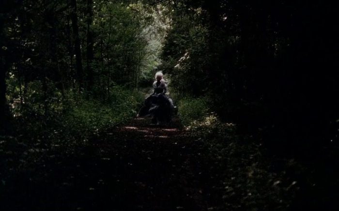 A woman running in the woods