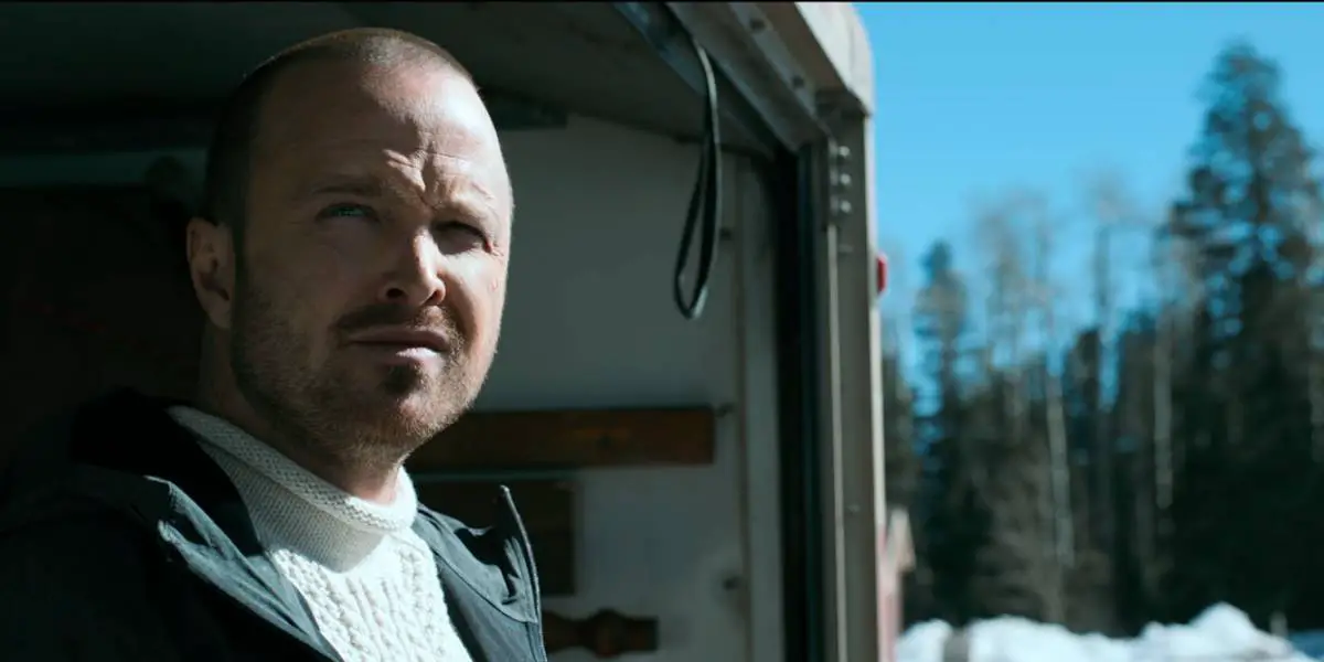 Jesse Pinkman exits a truck and looks out at the Alaskan wilderness