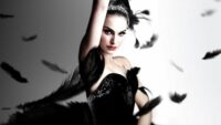 Natalie Portman as The Black Swan