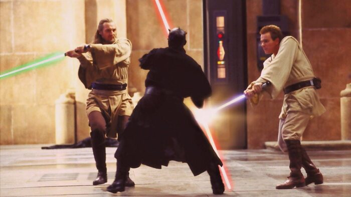 Qui-Gon Jinn and Obi-Wan Kenobi battle it out with Darl Maul using lightsabers on Naboo