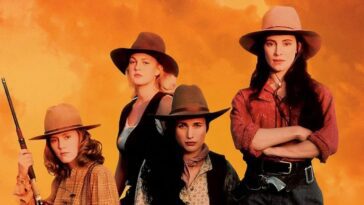 The women of Bad Girls pose with their guns in a stereotypical "cowboy" stance.