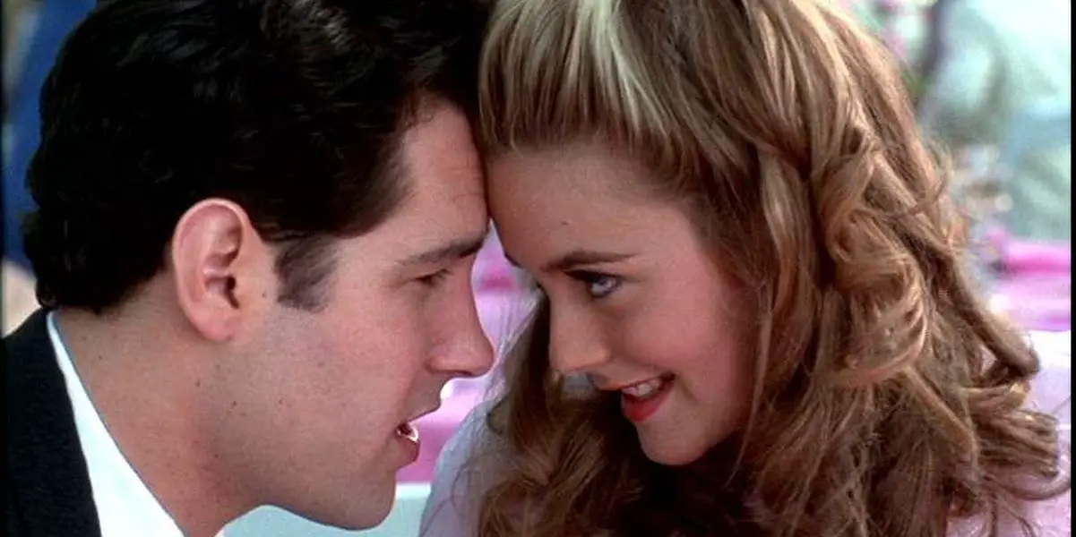Cher and Josh, foreheads touching, look at one another in Clueless