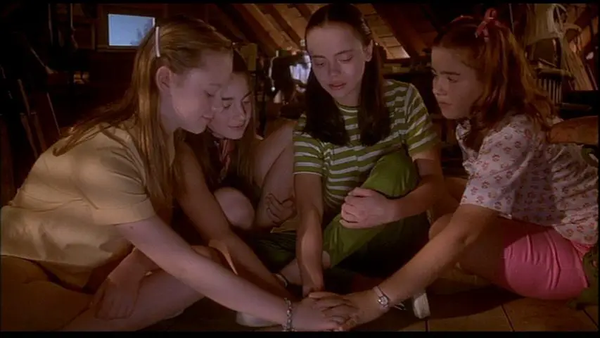 Young Teeny, Samantha, Roberta, and Chrissy make a pack in the attic. All hands in.