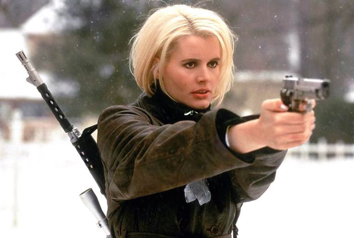 "Charly"Baltimore points her gun at some bad guys outside in the snow
