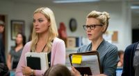 Margot Robbie and Kate McKinnon stand next to each other during Bombshell