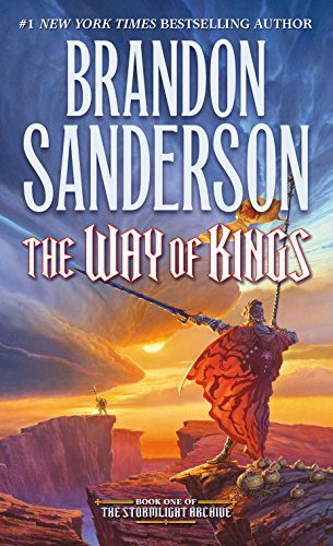 The cover of The Way of Kings,which features a man in resplendent armor holding a flag and large sword on a cliff, while a massive storm starts in the background