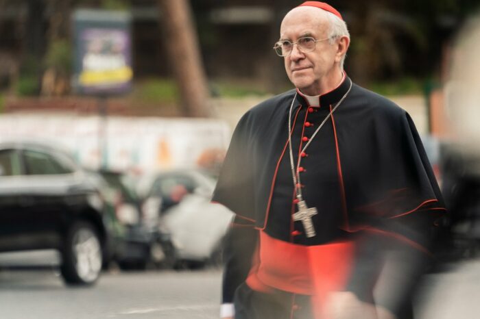 Cardinal Bergoglio waits for a driver to travel to a meeting.