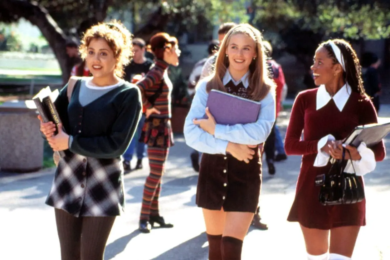 Cher, Tai and Dionne are walking to class and laughing