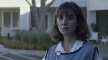 Alison Brie stares at something off screen