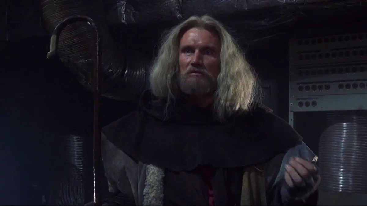 Dolph Lundgren as the shepherd-like assassin street preacher in Johnny Mnemonic