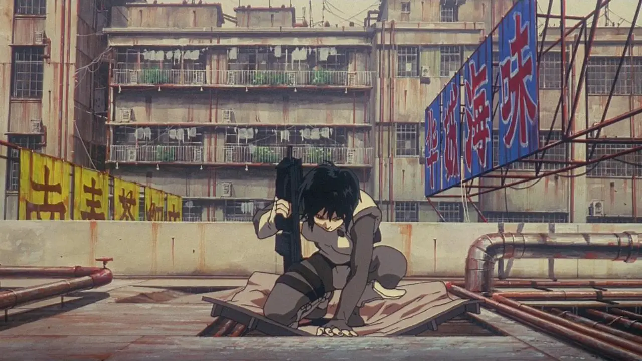 Kusanagi does a hard landing on top of a building with gun in hand