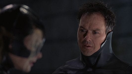 Bruce Wayne stares at Catwoman in Tim Burton's Batman Returns