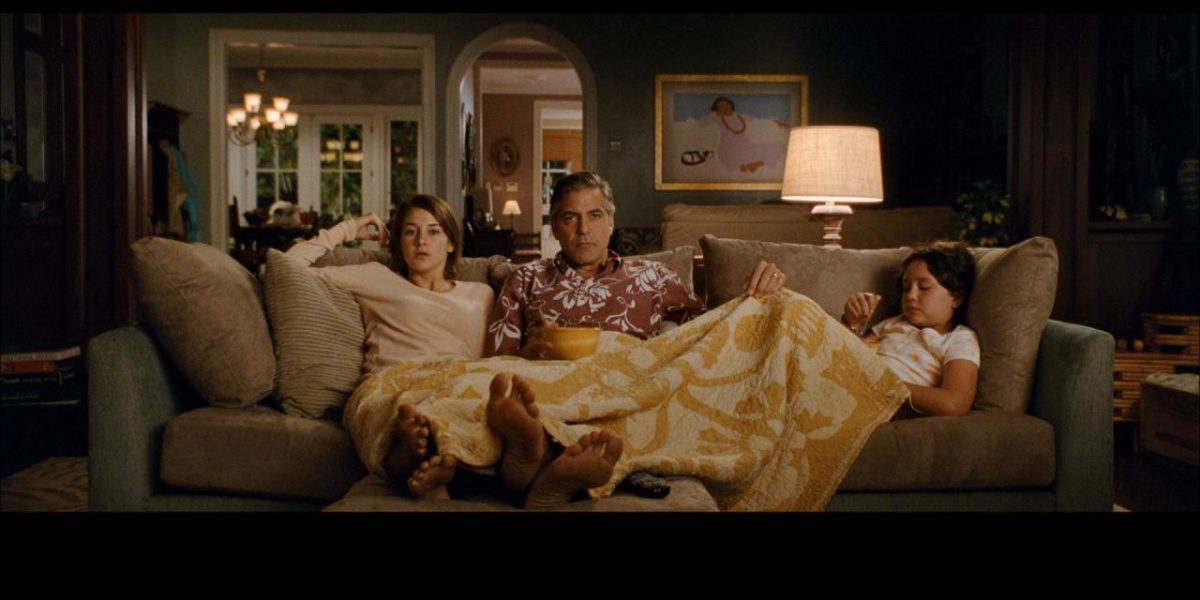 The Descendents family on the sofa together