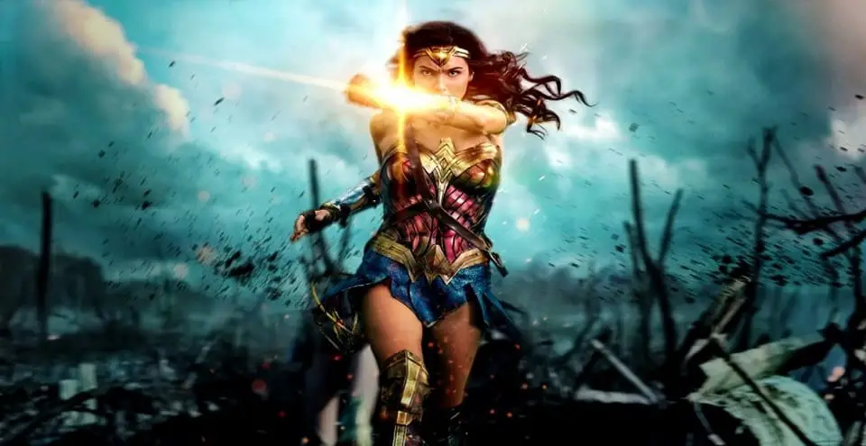 Wonder Woman marching out into No Man's Land, blocking a bullet with her armour.
