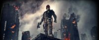 Dredd stands on a buildings edge with gun in hand surrounded by burning buildings