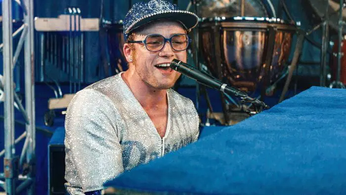 Taron Edgerton as Elton John performing in Rocketman.