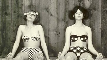 Marie II and Marie I sitting in bathing suits