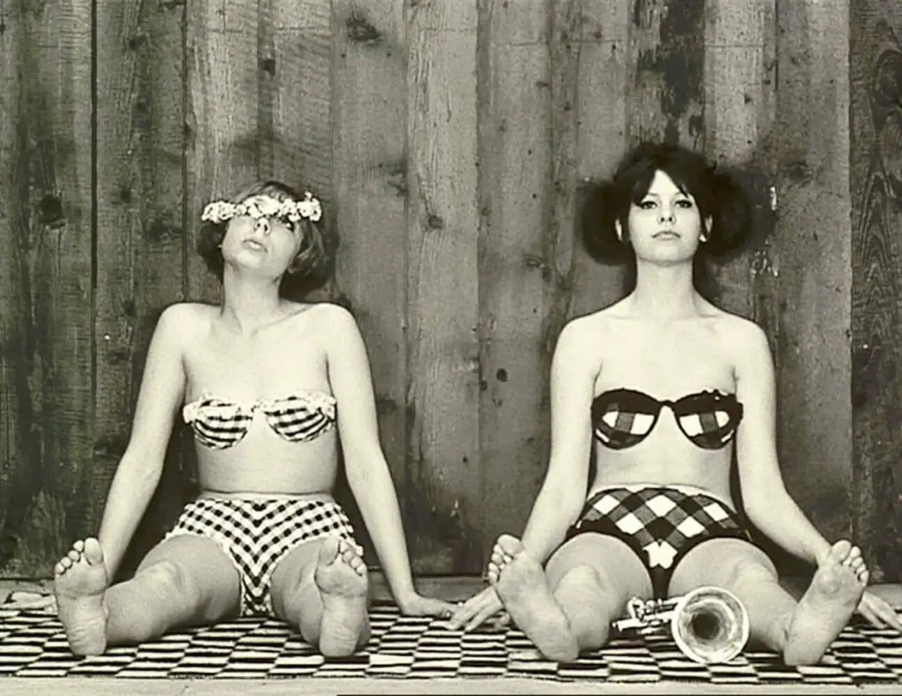 Marie II and Marie I sitting in bathing suits