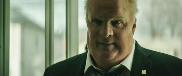 Rob Ford stares down his assistants.
