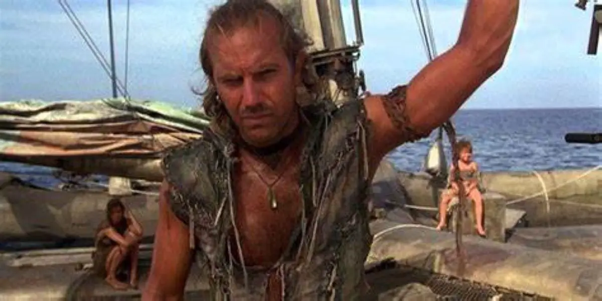 Kevin Costner as the Mariner on his boat on endless sea in Waterworld