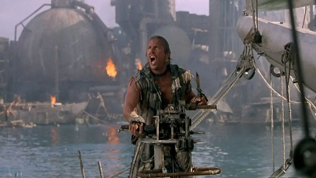 Kevin Costner as the Mariner amongst the burning atoll set of Waterworld