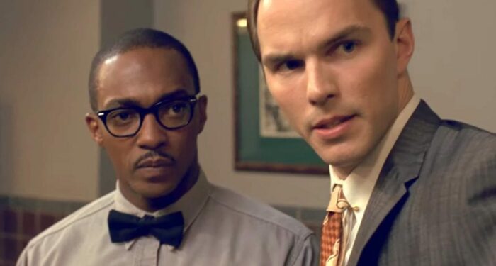 Anthony Mackie and Nicholas Hoult stare at something off screen