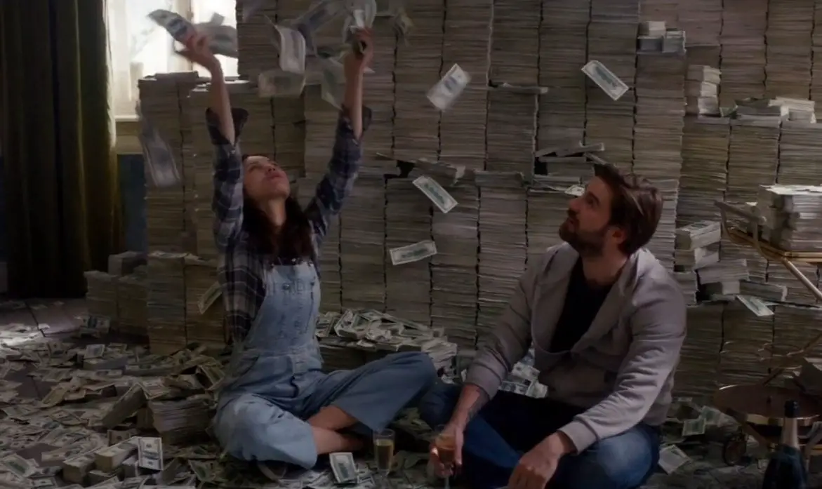 Kate throws up a large stash of money while Matt looks on