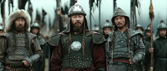 Genghis Khan stands at the front of his army with his General's by his side.