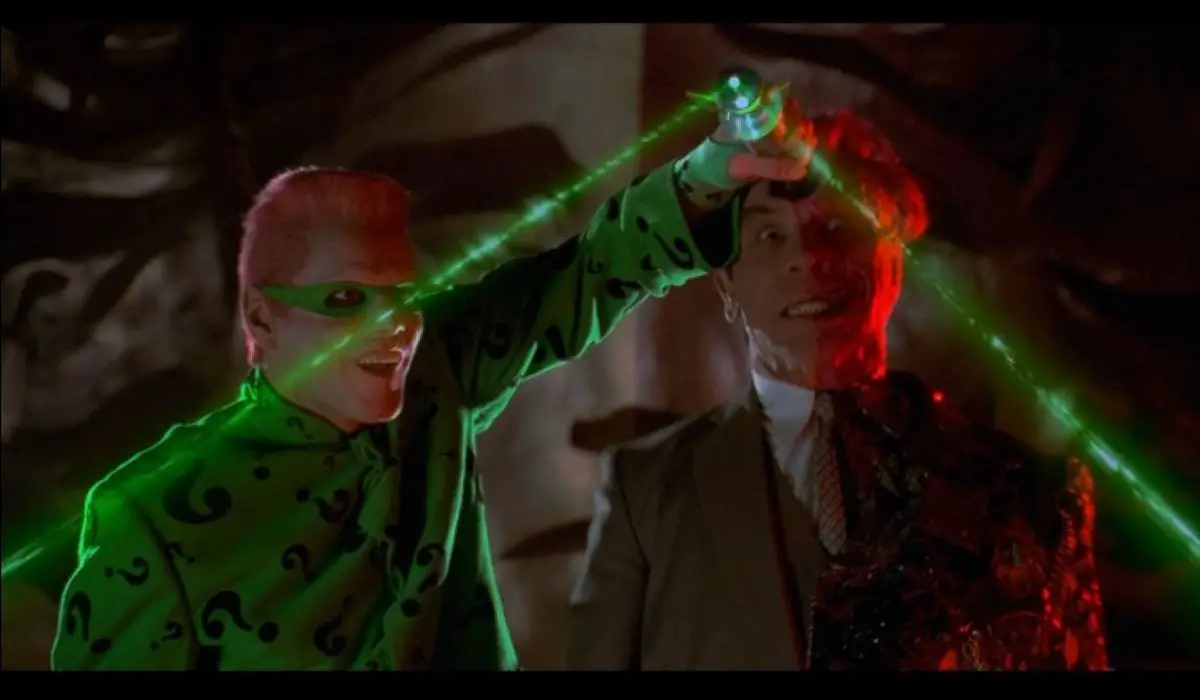 The Riddler and Two Face mess around with The Riddler's mind control device in Batman Forever