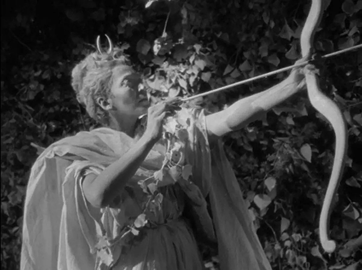 Diana shooting an arrow at a target offscreen