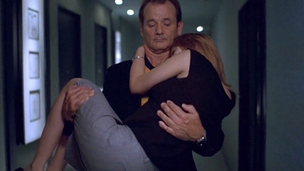 Bob carries Charlotte in his arms