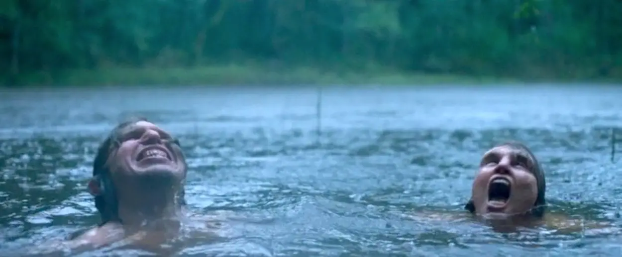 Eva Melander as Tina swims in the forest lake with Vore, played by Eero Milonoff