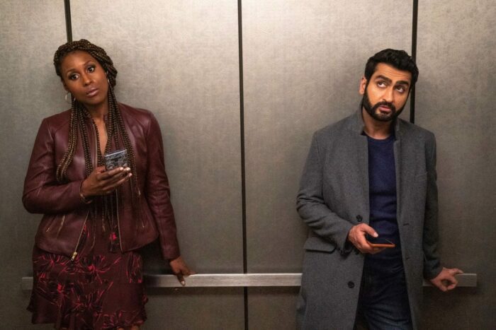 Leilani and Jibran ignore each other in an elevator.